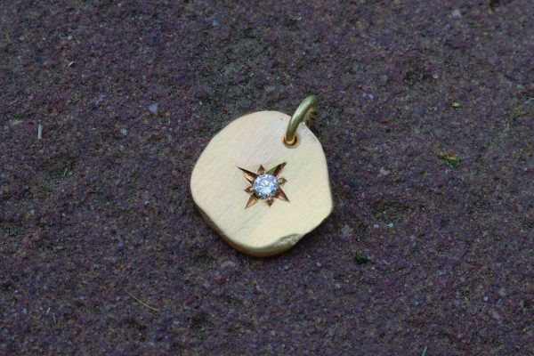 A finished star set diamond piece by Estona